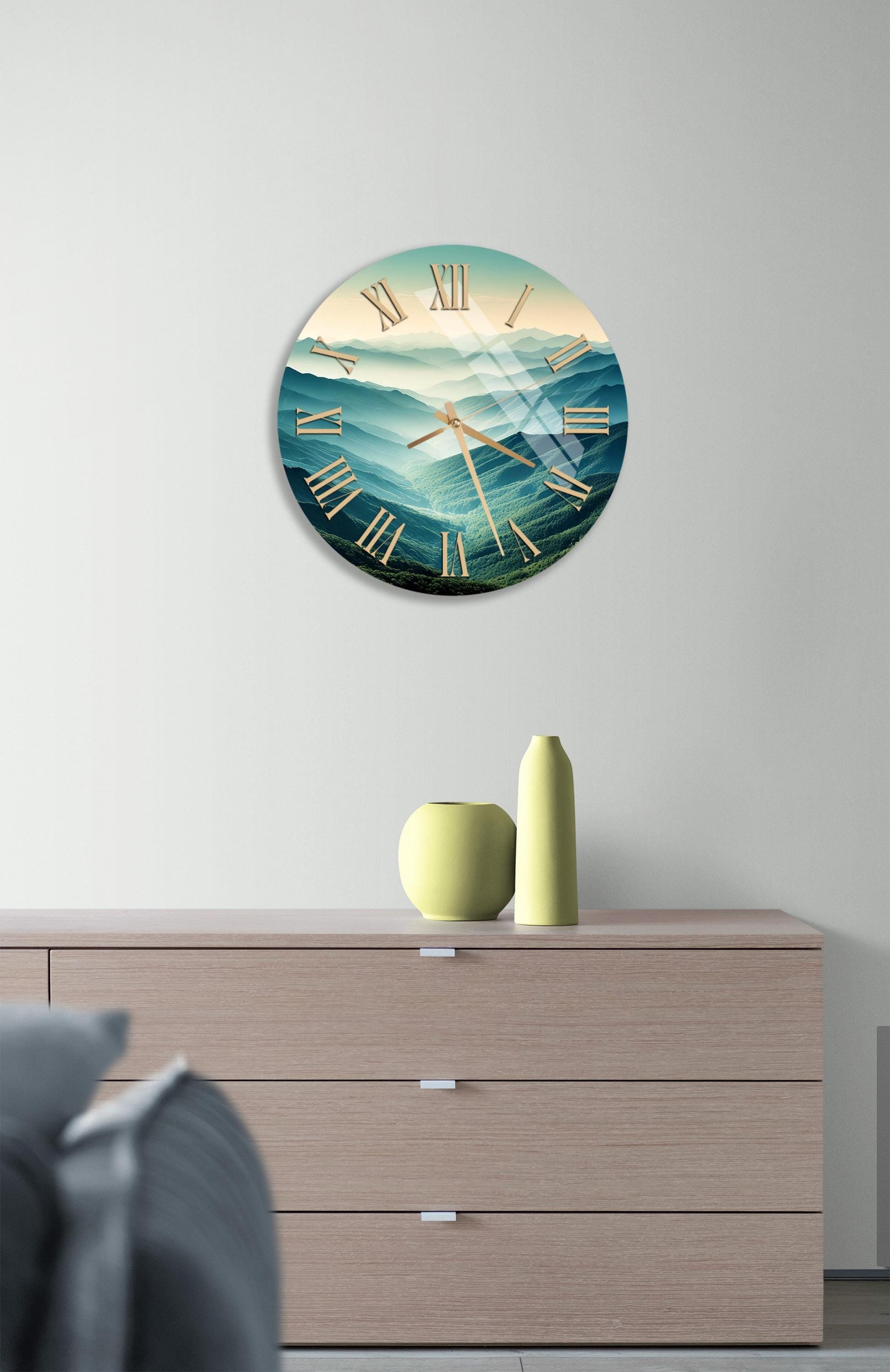 a clock on a wall above a dresser