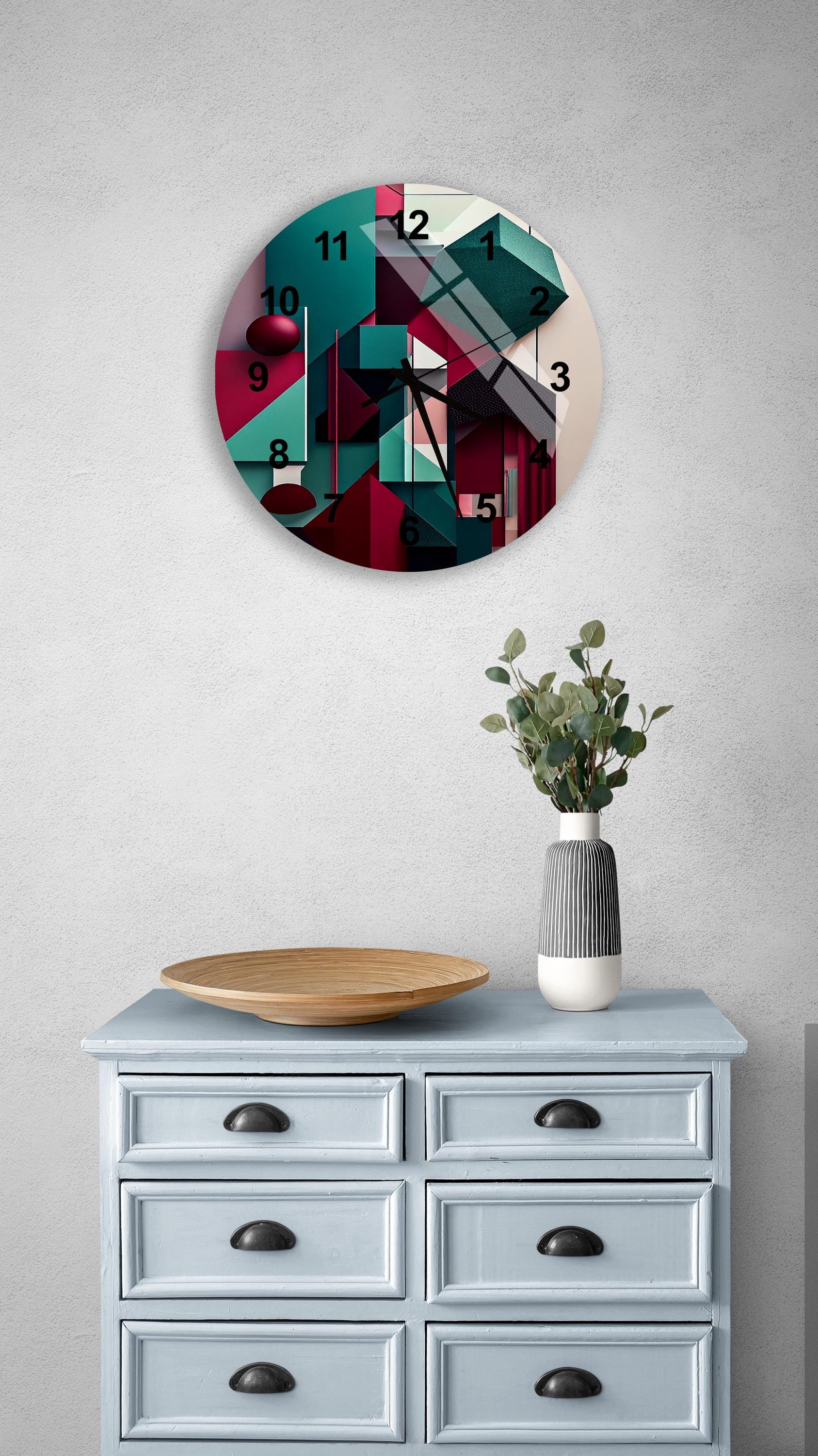 a clock on a wall above a dresser