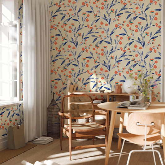 a cozy and inviting living space with a floral wallpaper pattern, a wooden table, and chairs. The room has a warm and natural ambiance, with a window providing natural light and a white curtain adding a touch of elegance.