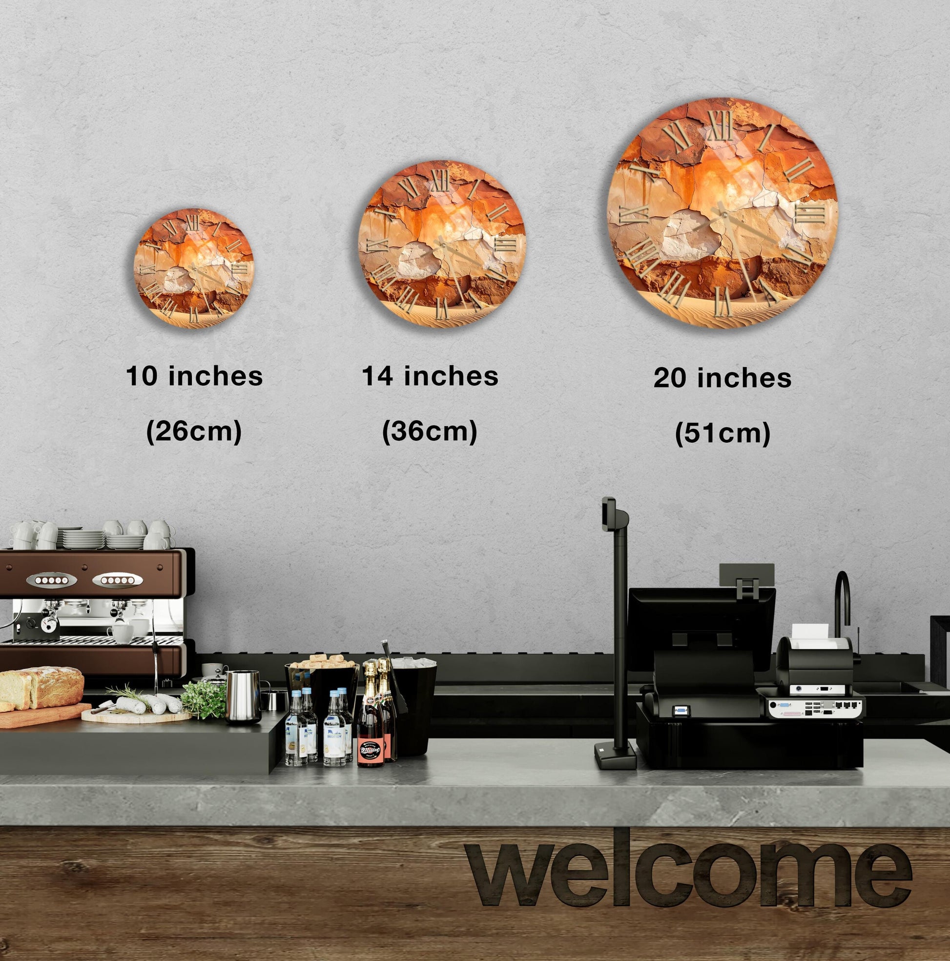 a counter with a cash register, a coffee machine, and a sign that says "welcome". There are three clock images displayed on the wall, each representing a different size: 10 inches, 14 inches, and 20 inches.