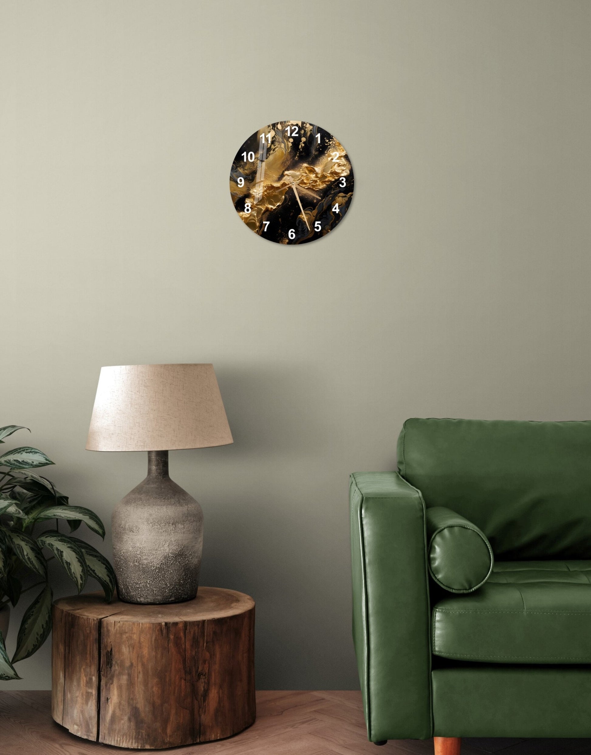 a living room with a green couch and a clock on the wall