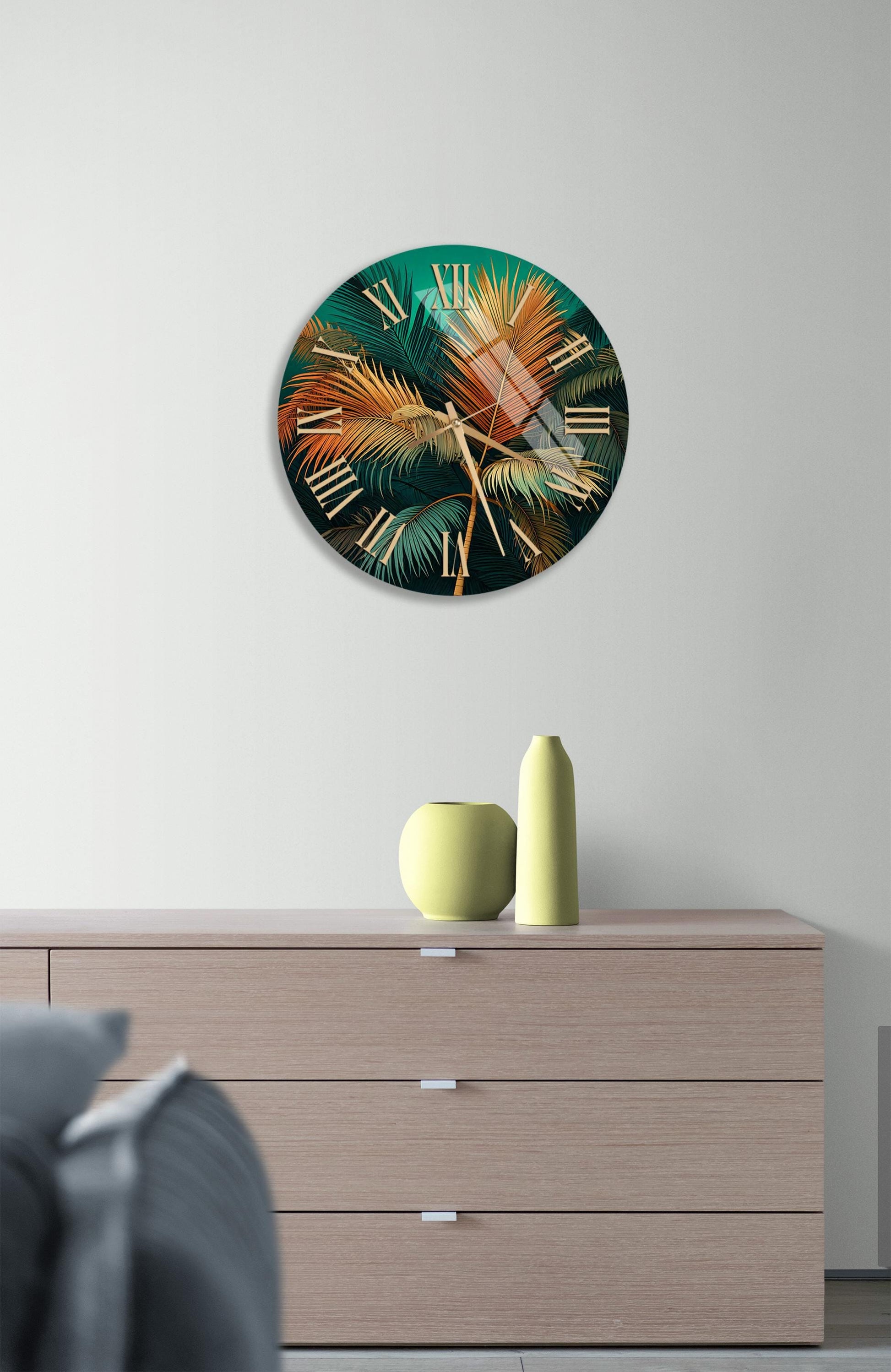 a clock with a green and orange design on it