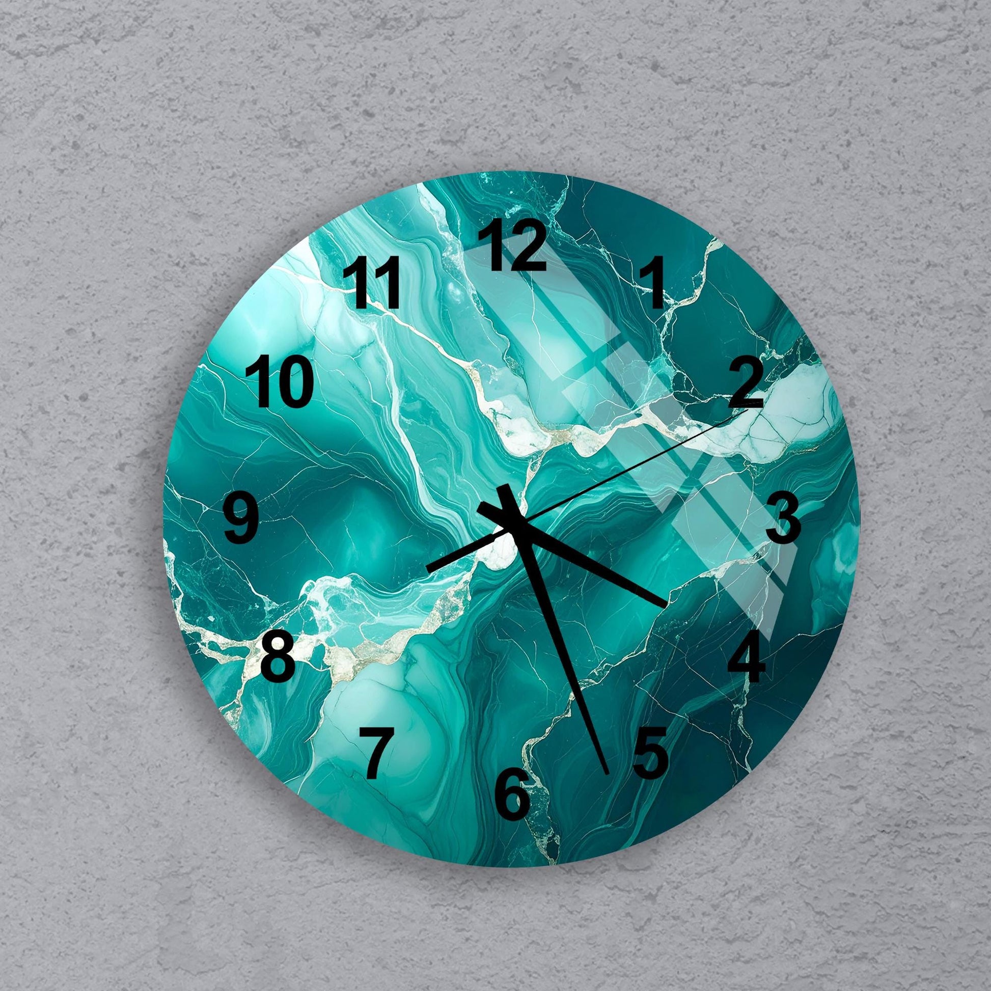 A round wall clock with a turquoise marble-like design, featuring black numbers and hands.