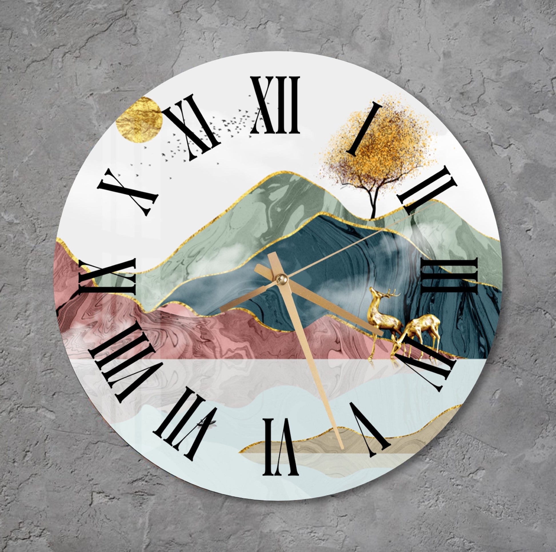 a clock with a painting of a mountain and a tree on it