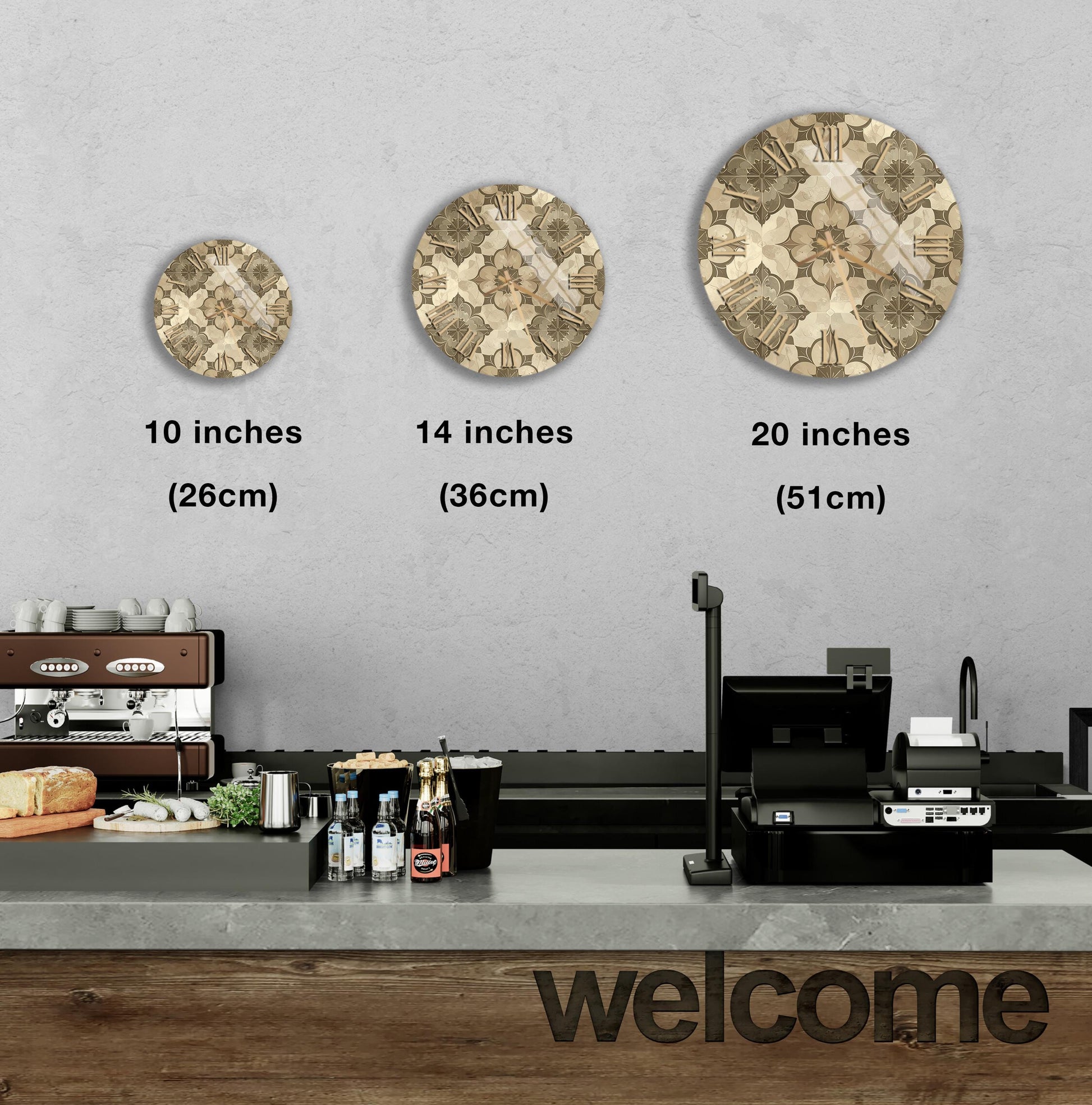 a counter in a restaurant with three different sizes of circular wall decorations above it, and a welcome sign below the counter.