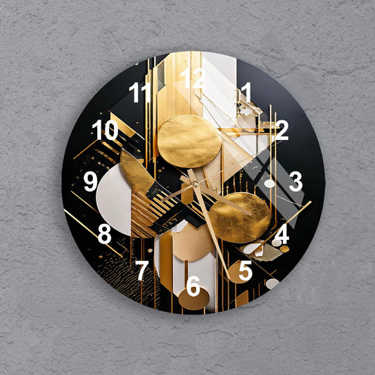 a black and gold clock on a gray wall