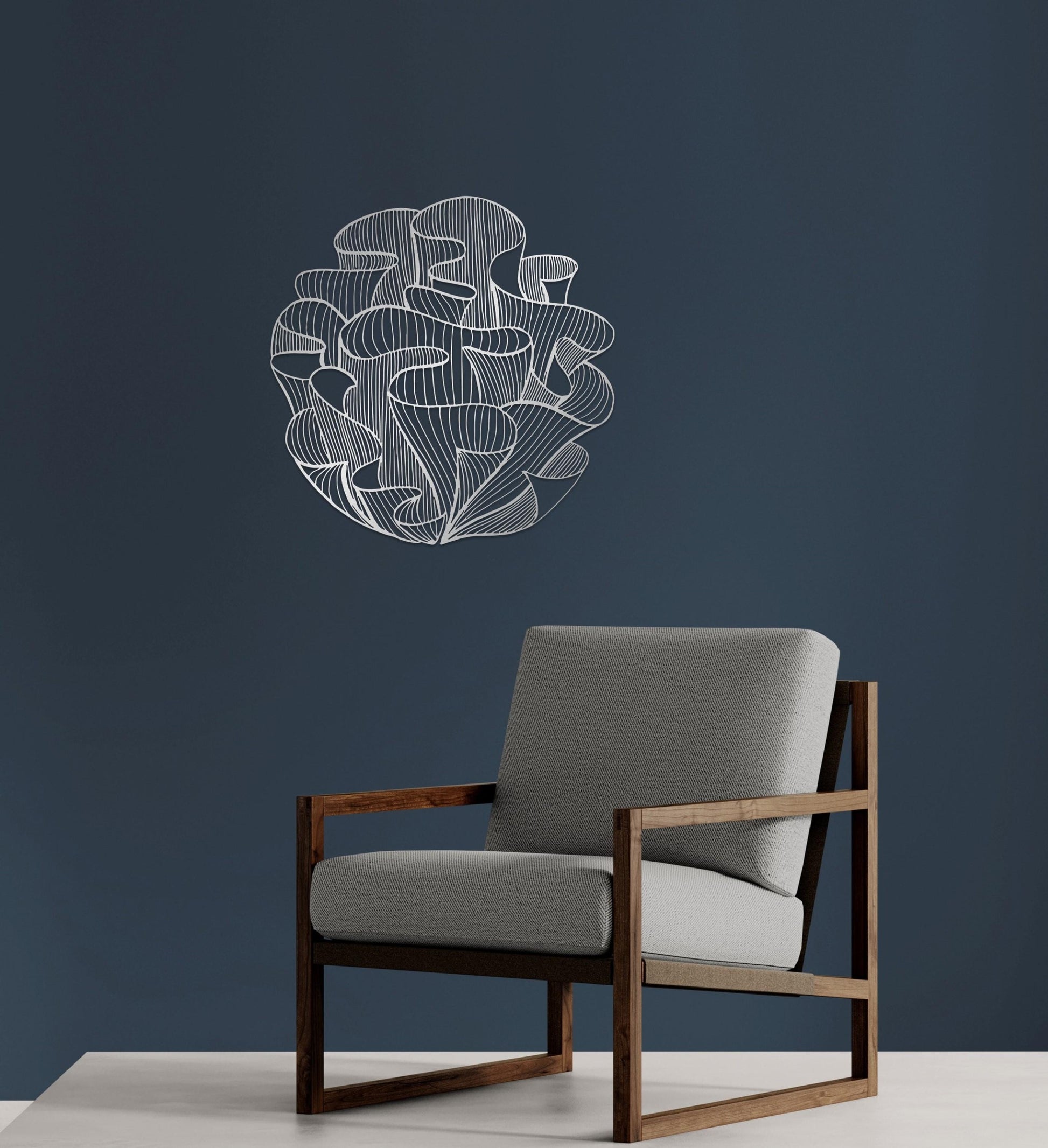 a chair sitting in front of a blue wall