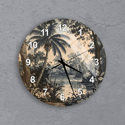 A round wall clock with a tropical landscape design featuring palm trees, a river, and other natural elements.
