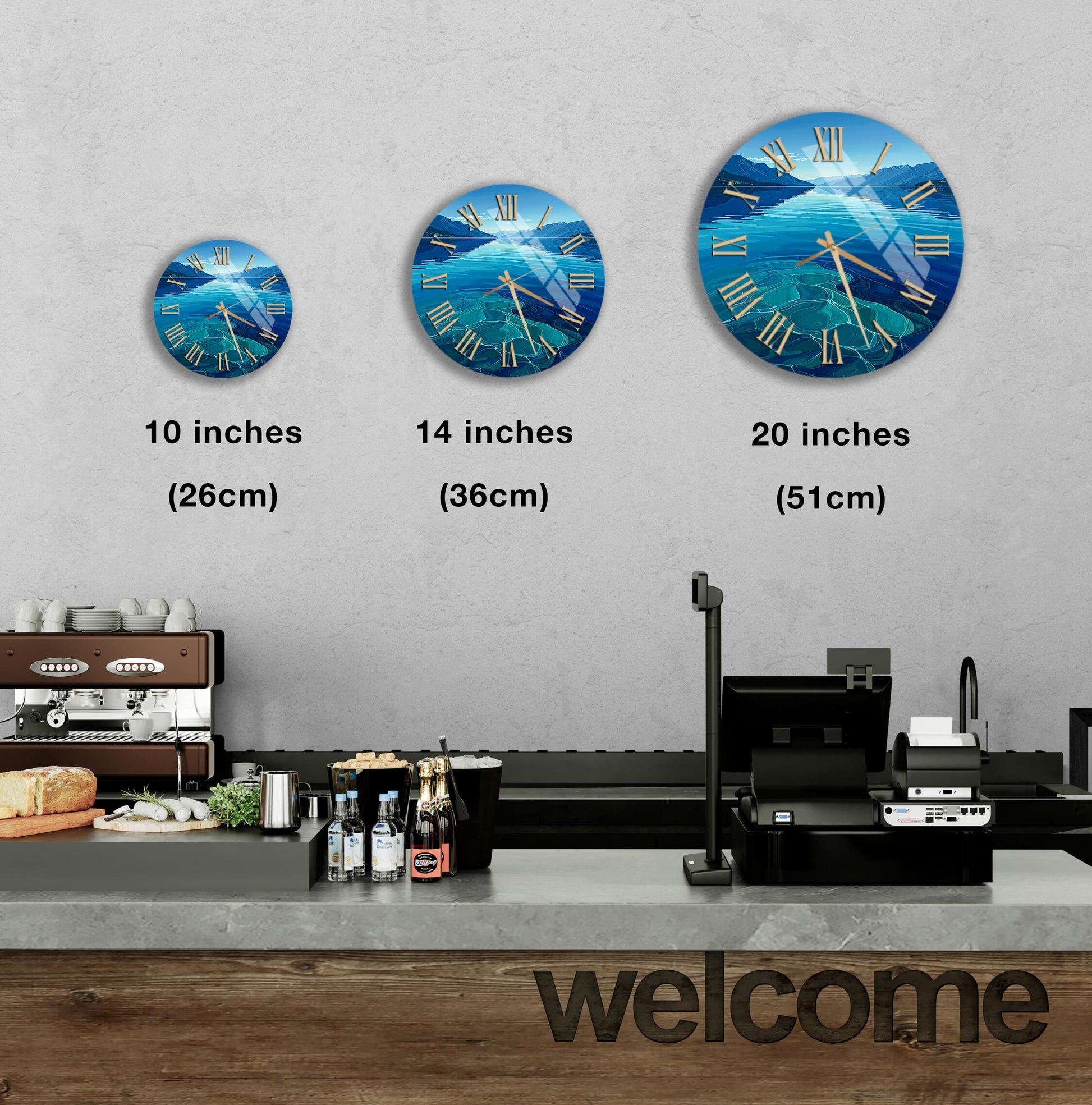 a wall with three clock faces of different sizes, each depicting a blue ocean scene. Below the clock faces, there is a counter with various items such as bottles and a sandwich. The word "welcome" is written on the counter.