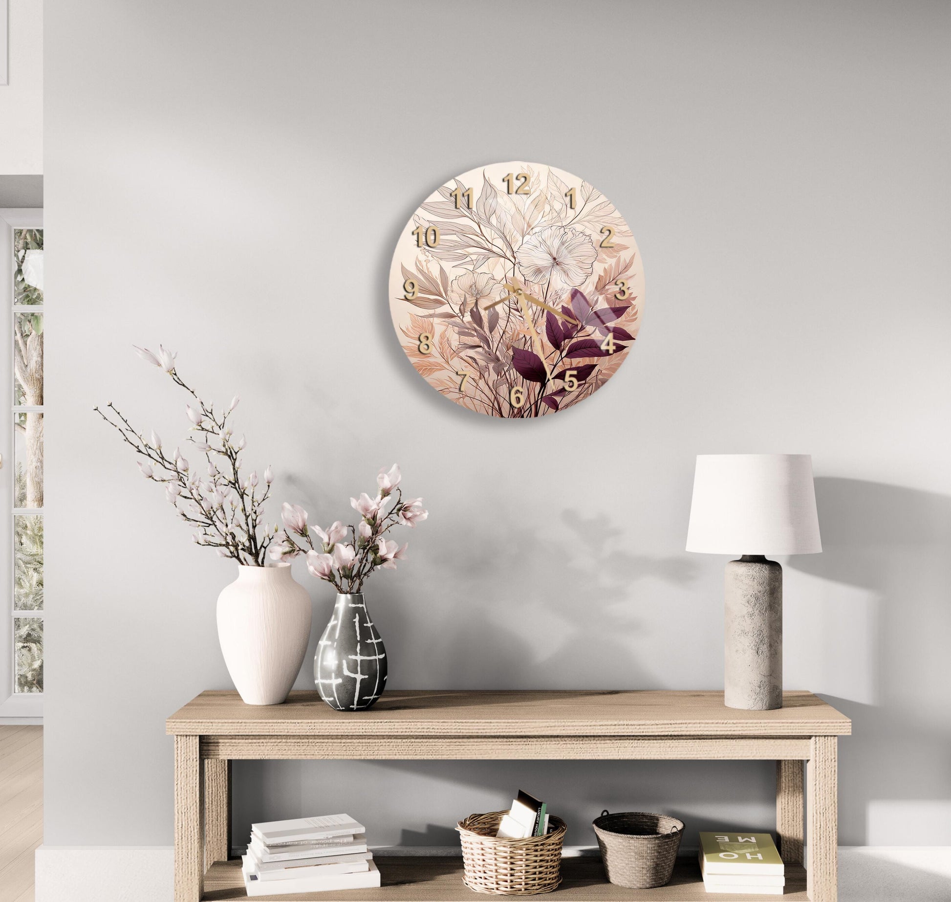 a table with a vase of flowers and a clock on the wall
