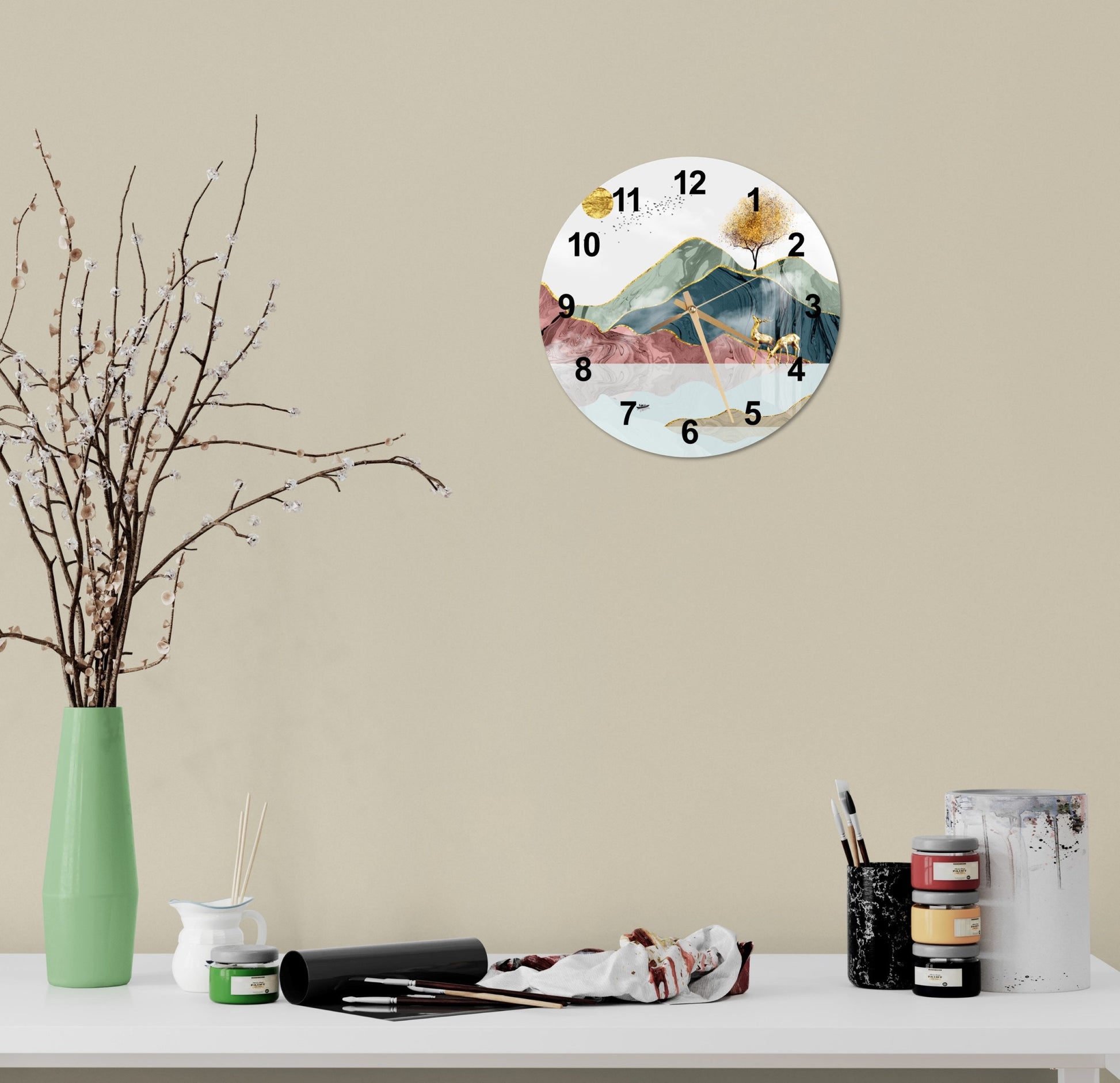 a white table with a green vase and a clock on it