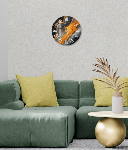 a living room with a green couch and a clock on the wall