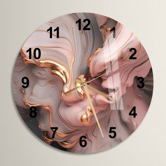 a clock with a pink and gold design on it