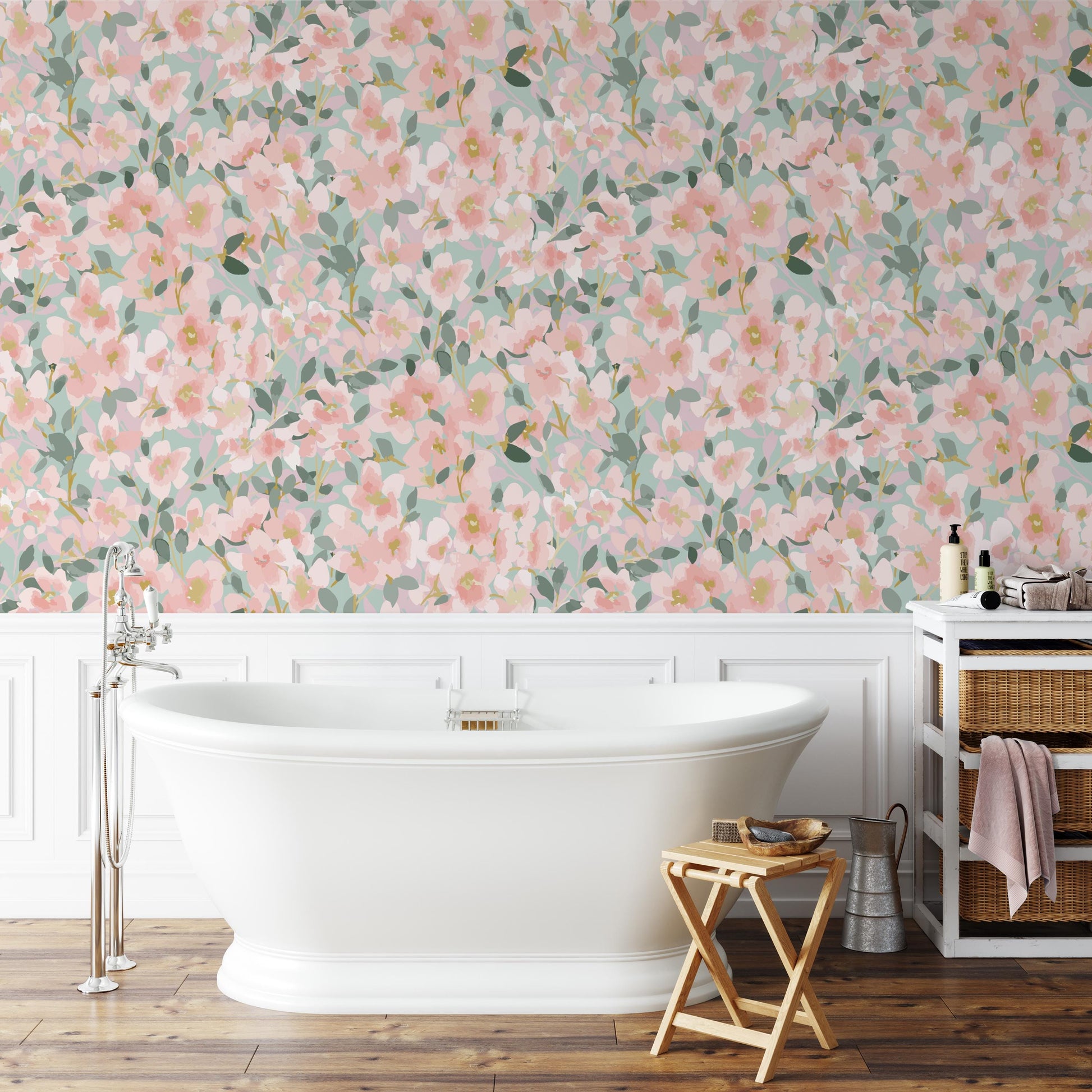 a bathroom with a white freestanding bathtub, a wooden stool, and a wicker basket. The walls are covered in a floral wallpaper with pink and green flowers, creating a serene and calming atmosphere.