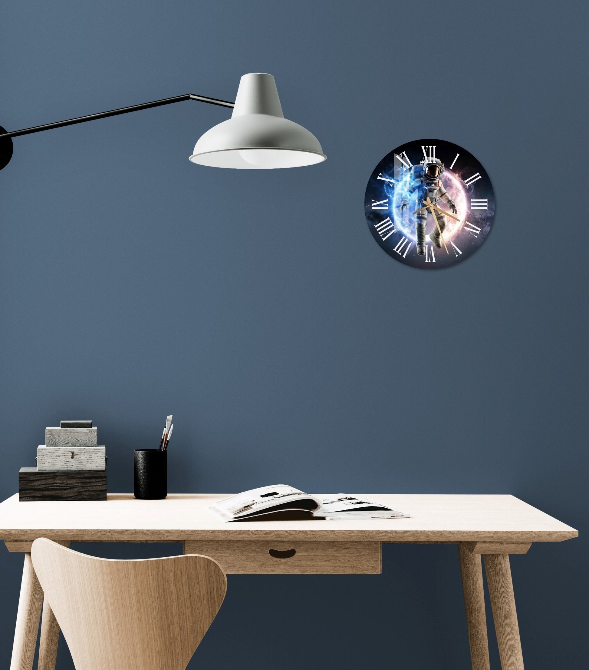 a desk with a chair and a clock on the wall