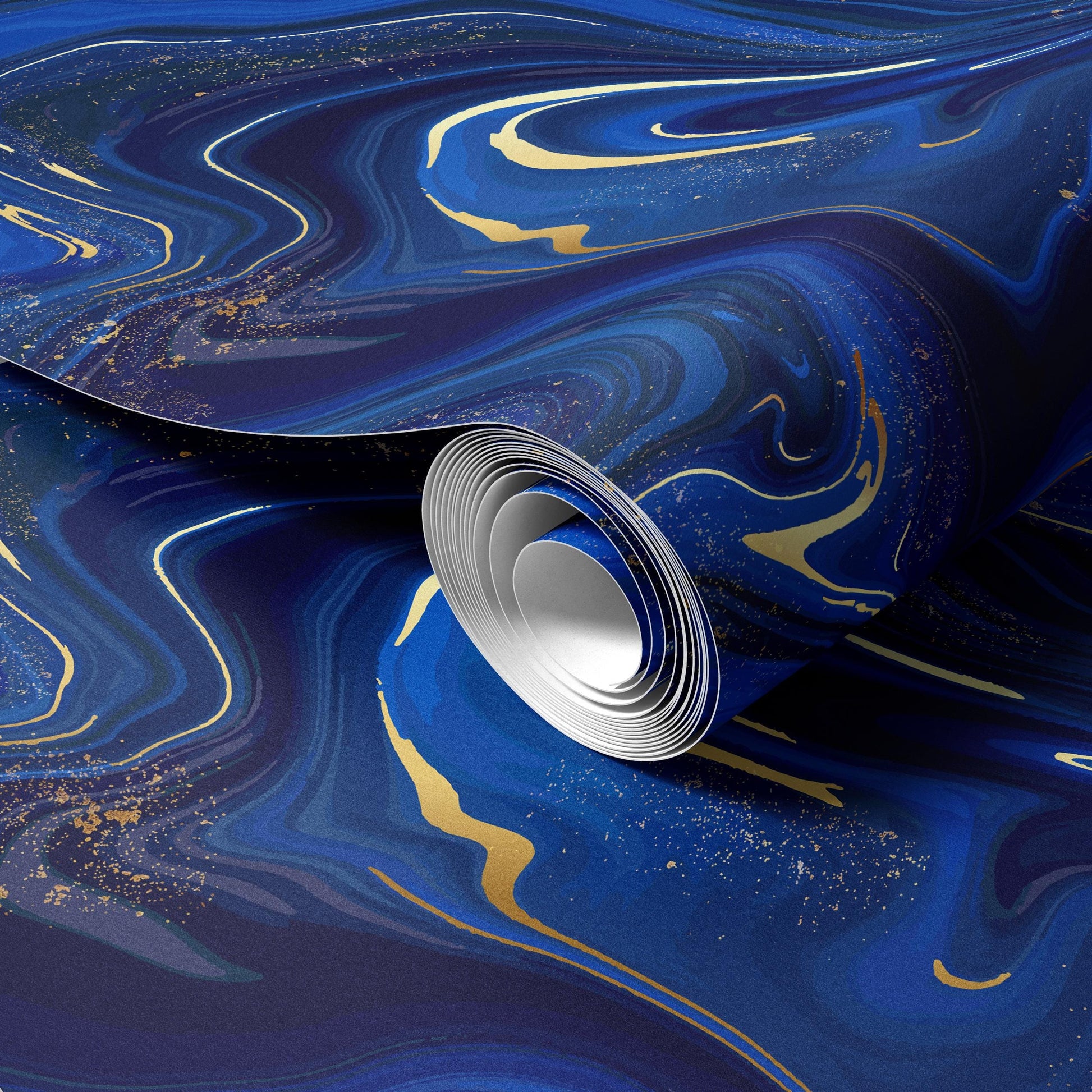 a close-up view of a roll of wallpaper with a swirling pattern of blue and gold colors.