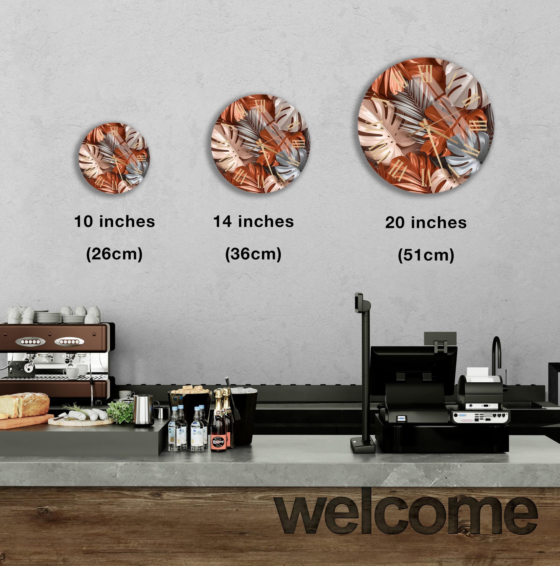 a counter in a restaurant with a welcome sign, and three circular wall decals of different sizes displaying a tropical leaf pattern.