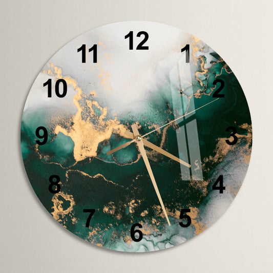 a clock with a green and gold design on it