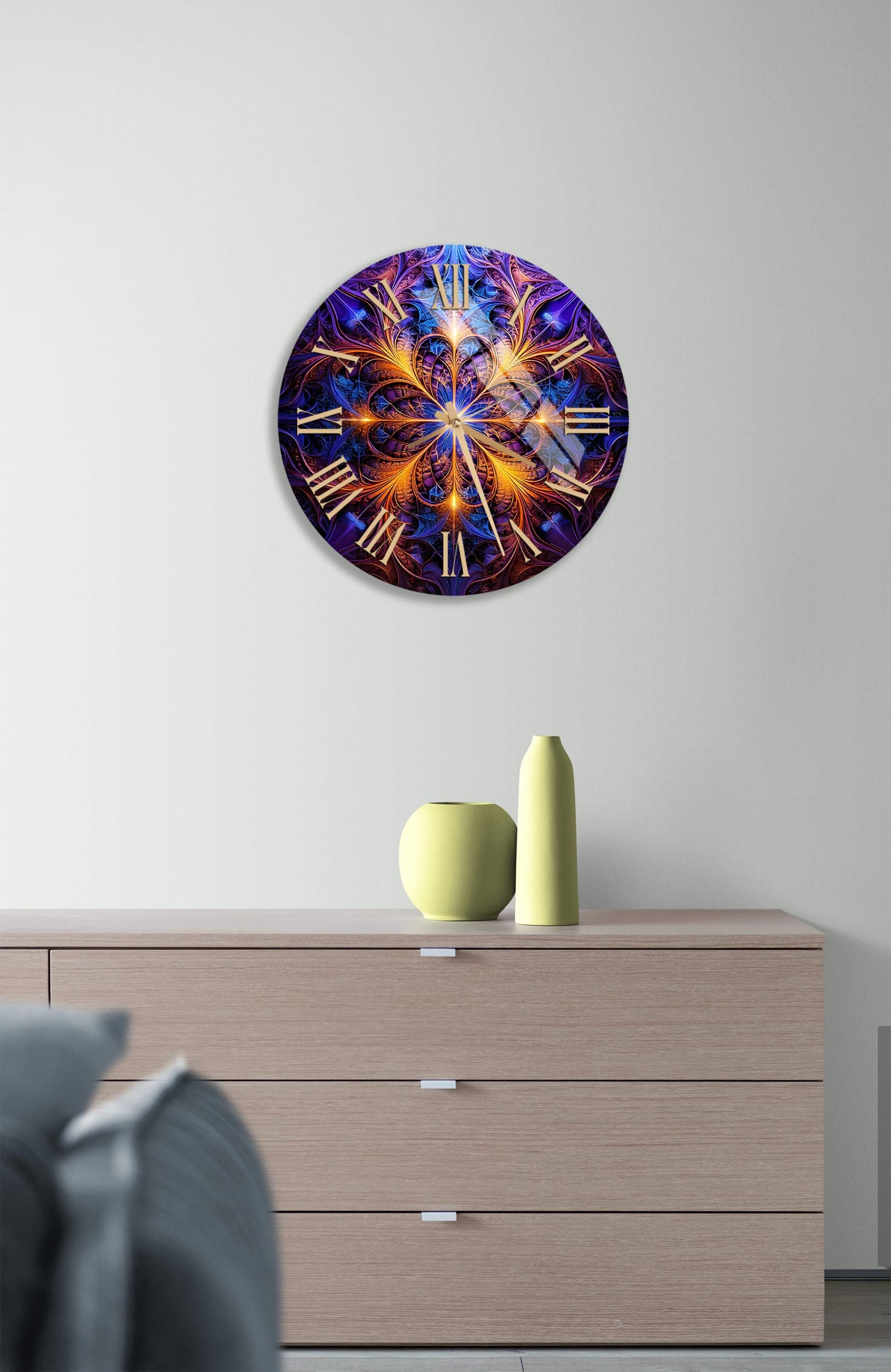 a large clock on a wall above a dresser